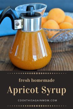 fresh homemade apricot syrup in a glass pitcher