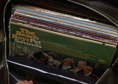 the beach boys'pet sounds album is packed in a black leather case with silver zippers