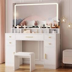 a white dressing table with a mirror and stool