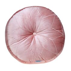 a pink round cushion on a white background