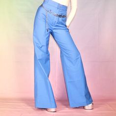 Vintage 70s bell bottoms 🦋 Vintage 1970s 🦋 Blue high waisted bell bottom flare disco retro trousers deadstock NWT Label: Sears, JR Bazaar  Made in USA  65% polyester  35% cotton Size 11/ 28 waist/ 32.5 inseam, see measurements  Super nice and chic disco flared wide leg pants ▫️original tags still attached, deadstock  ▫️Awesome metal adjustable straps on each side of waist  ▫️Two button closure, zipper fly  ▫️Two front pockets, no back pockets  ▫️Very nice lightweight material, no stretch 🌈 MEASUREMENTS 🌈 Waist: 27" (sits very high)  Rise: 13.5" Hips: 40" Inseam: 33" Thigh at top: 12" flat Model is 5'4" wears size small, these fit loose, pinned in photos slightly  Free USA shipping  #70s #vintage #deadstock #retro #bellbottoms 70s Inspired High Waist Fitted Flare Jeans, Chic Blue Flare Wide Leg Pants, Blue Cotton Wide Leg Flares, 70s Inspired Fitted Wide Leg Jeans, Chic Blue Full-length Flares, Blue Fitted High Waist Flares, Blue High Waist Fitted Flares, Fitted High Waist Blue Flares, Trendy Blue Wide Leg Flares