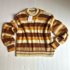 Size Small Brand New With Tags Knitted Oversized Sweater Cream, Rust Orange, Mustard And Tan Stripes Measurements: Arm Pit To Arm Pit: 24 In Shoulder To Hem: 24 In Casual Orange Knit Sweater, Cozy Orange Knit Top, Retro Chunky Knit Fall Sweater, Retro Chunky Knit Sweater For Fall, Oversized Retro Acrylic Sweater, Striped Chunky Knit Crew Neck Sweater, Brown Chunky Knit Acrylic Sweater, Oversized Striped Chunky Knit Sweater, Brown Textured Knit Acrylic Sweater