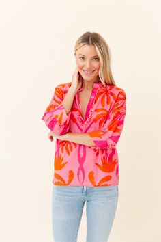 Made from our light and airy cotton voile, and detailed with our signature hand-touched embellishments. Drew is designed with artfully gathered sleeves that give it a relaxed silhouette. Cotton Voile - light and airy Hand Embellished Neckline Runs true to size Relaxed Fit Split Neck Vacation Blouse, Summer Split Neck Pink Blouse, Relaxed Fit Split Neck Blouse For Vacation, Relaxed Split Neck Blouse For Vacation, Spring Blouse With 3/4 Gathered Sleeves, V-neck Blouson Sleeve Top For Beach, V-neck Top With Blouson Sleeves For Beach, Spring V-neck Blouse With Unlined Sleeves, V-neck Blouse With Unlined Sleeves For Spring