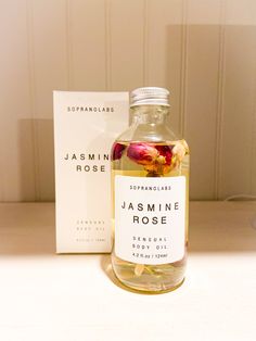 This Rose & Jasmine-infused luxurious blend of precious oils combined with Green Tea Extract is fast-absorbing, incredibly hydrating and protective. It restores suppleness and softness and brings a healthy, youthful-looking glow to the skin.  This Sensual Body Oil is the ultimate multi-purpose lightweight beauty oi Jasmine Body Oil, Hair Oil Packaging, Body Oil Packaging, Infused Body Oil, Rose Body Oil, Moisturizing Body Oil, Herbal Skin Care, Bath Oil, Barrier Free