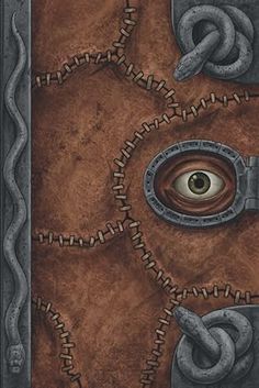 an eye in the middle of a book cover with chains and rings around it's eyes