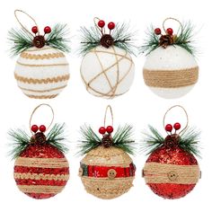 four christmas ornaments are hanging from twine