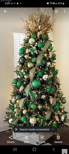 a christmas tree with green and gold ornaments