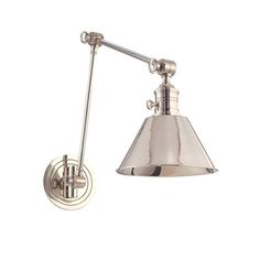 a wall light with a metal shade on the top and bottom part of it's arm