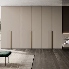 a living room filled with lots of furniture next to a wall mounted cabinet and window