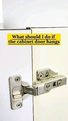 an image of a door with a sign on it that says, what should i do if the cabinet door hangs?