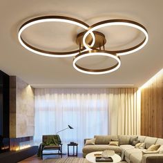 modern living room with round lights and couches