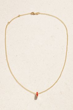 Foundrae's 18'' necklace is strung with an enameled bead that spells out ' Fuerza ' - which translates to 'Strength' - and has a carefully carved heart at its center. It's handmade from 18-karat gold and can be stacked with more of the sentimental charms, depending on what you want to hold close to you that day. The 18-inch chain can be adjusted between a variety of lengths. Classic Necklace With Delicate Chain And Heart Pendant, Gold Single Strand Heart Necklace, Gold Heart-shaped Single Strand Necklace, Classic Heart-shaped Necklace With Cable Chain, Dainty Single Strand Diamond Necklace Gift, Yellow Gold Charm Necklaces With Rolo Chain For Gift, Classic Heart Pendant Necklace With Cable Chain, Fine Jewelry Initial Necklace With Cable Chain As Gift, Delicate Necklace With Round Pendant And Cable Chain