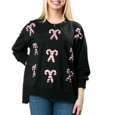 Bring on the festive vibes with our Holiday Pullover! Featuring fun and sweet candy canes and gingerbread men, this playful and comfy pullover is perfect for the entire holiday season. Stay cozy and stylish with this must-have piece. (No ugly sweaters here!) Details & Care SM (4-8), ML (10-14) 28" L from shoulder point to hem Crew neck Banded cuffs, neck and bottom Long sleeves 65% Polyester, 35% Cotton Machine wash inside out on Cold. Dry flat. Imported Casual Black Christmas Sweatshirt, Black Christmas Hoodie, Sweet Candy Canes, Black Crew Neck Christmas T-shirt, Black Long Sleeve Christmas Sweatshirt, Black Long Sleeve Christmas T-shirt, Rain Poncho, Travel Dress, Holiday Sweatshirt