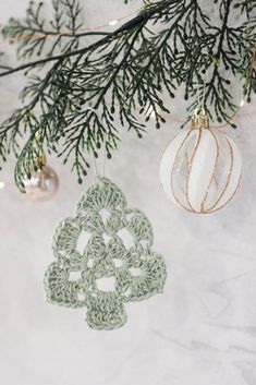 an ornament hanging from a christmas tree