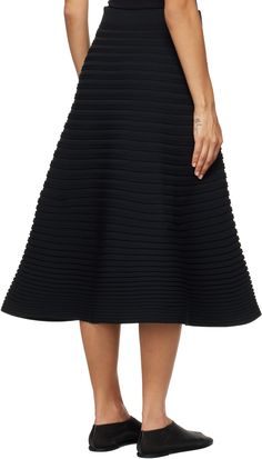 Garment-pleated polyester jersey midi skirt. · Rib-knit elasticized waistband · Rolled edge at flared hem Supplier color: Black Flared Denim Skirt, Pleats Please, Knit Midi Skirt, Pleats Please Issey Miyake, Black Midi Skirt, Knit Midi, Pleated Midi Skirt, Denim Flares, Green Skirt