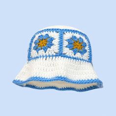 Colorful knit bucket hat in a beanie style, featuring either floral or geometric shapes. This hat offers a playful yet chic look, perfect for adding a unique touch to your casual outfits. 22-inch circumference. window.adminAccountId=236468556; Crochet Korean, Flower Bucket Hat, Style Bucket Hat, Colorful Knit, Crochet Bucket, Flower Bucket, Crochet Bucket Hat, Beanie Style, Adventure Style