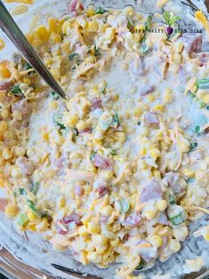 a bowl filled with macaroni and cheese on top of a table