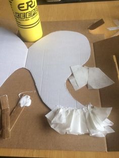 the paper is cut out and placed on the table