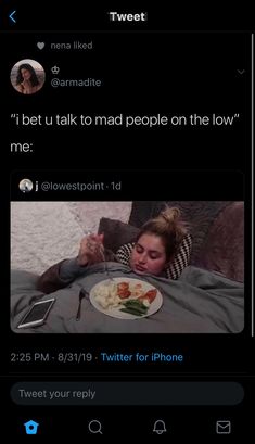 a woman laying in bed with her head on the pillow while eating food from a plate