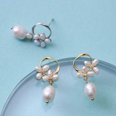 An elegant pair of floral pearl earrings features a baroque pearl dangle tear drop on dainty stud earrings, comes in gold or silver color. These elegant pearl drop earrings are perfect wedding jewelry gift, simple bridal earrings, or everyday earrings gift for your love one. Materials are solid 925 sterling silver with gold plate or platinum plate and pearls. *Pearls are natural so shape and size maybe vary a little bit. Jewelry Care: See more information about how to care for your jewelry here. Simple Bridal Earrings, Pearl Teardrop Earrings, Jewelry Design Drawing, Bridemaids Gifts, Dainty Studs, For Your Love, Everyday Earrings, Gold Earrings Dangle, Pearl Stud Earrings