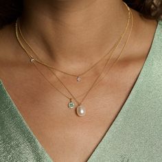 We’re picky about our pearls. Our collection of modern-feel pearl pieces takes your grandmother's favorites and incorporates them into the latest trends, interpreted from our NYC-gal perspective. These gem-quality pearls are freshwater cultured beauties, set in solid gold that won't tarnish or flake. We may have expensive taste, but crazy mark-ups aren’t really our thing. So we balance the best quality and the best price — enough said. 14k Solid yellow gold 9mm x 7mm Oval-shaped freshwater cultu Modern Pearl Drop Pendant Necklace, Diamond Necklace With Pearl Chain, Elegant Teardrop Pendant Pearl Necklace, Everyday Luxury Pearl Pendant Jewelry, Elegant Oval Pendant Birthstone Necklace, Modern Pearl Necklace With Pearl Pendant, Fine Jewelry Pearl Pendant For Everyday Luxury, Modern Teardrop Jewelry With Pearl Charm, Modern Pearl Pendant Necklace For Wedding