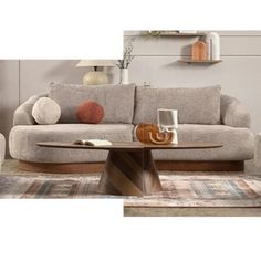 a living room scene with focus on the couch and coffee table