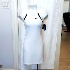 Nwt Nike Dri-Fit White Size Xs Tennis Dress. Bust Is 16 Inches Across. Muscle Tee Dress, Nike Jordans Women, Grey Jersey Dress, White Tennis Dress, Nike Sportswear Women, Nike Dresses, Camo Dress, Golf Dresses, Athletic Dress