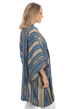 The long silhouette of our colorful Aztec-inspired kimono is comfy and breathable. As an added bonus, this piece has two deep pockets on either side. Materials: 100% Cotton Size: 27” x 44” Made In India Blue Long Cotton Outerwear, Long Blue Cotton Outerwear, Casual Long Blue Outerwear, Multicolor Relaxed Fit Outerwear With Pockets, Blue Outerwear For Spring Loungewear, Relaxed Fit Multicolor Outerwear With Pockets, Casual Blue Cotton Kimono, Blue Bohemian Outerwear With Pockets, Fall Vacation Outerwear With Kimono Sleeves