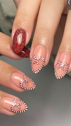 Nails by Gsbeautybase: picture from her Instagram post Christmas Nails Candy Cane French Tip, Candy Cane French Nails, Candy Cane Heart Nails, French Tip Candy Cane Nails, Candy Cain Nails, Candy Cane French Tip Nails, Christmas Nails Candy Cane, Christmas Candy Nails, Candy Nails