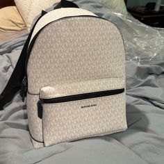 Unisex Backpack - Designer Michael Kors Backpack With Logo, Everyday White Backpack With Logo, White Logo Backpack For Everyday Use, Everyday White Logo Backpack, Michael Kors Travel Backpack With Logo, Classic White Backpack For Travel, Classic White Travel Backpack, Michael Kors White Backpack For Daily Use, Michael Kors White Travel Backpack