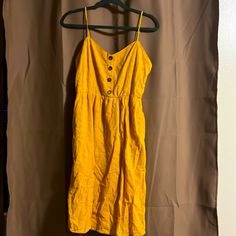 Every Detail Of This Dress Is So Cute. You Can Wear This For Anything. The Yellow Is More Like Golden Or Mustard. Fits Beautifully! Just Doesn’t Fit Me Anymore. Been Packed Away Since Last Summer, In A Clean Air Tight Container. Just Need To Be Steamed Or Ironed Yellow Cotton Midi Sundress, Yellow Knee-length Casual Sundress, Yellow Casual Knee-length Sundress, Casual Yellow Knee-length Sundress, Yellow Casual Sundress With Spaghetti Straps, Mustard Cotton Vacation Dress, Yellow Cotton Midi Vacation Dress, Yellow Cotton Midi Dress For Vacation, Yellow Knee-length Sundress For Brunch