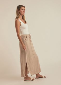 Slip on The Slip It On Skirt for breezy styling on sunny days. The elastic drawstring band hits high on the waist with a slim fit. Since the midi cut from a lightweight, double gauze fabric that's made from soft, breathable cotton, it's are sure to be your next warm weather favorite. Pair with The Ex-Boyfriend Shirt in Beige for an airy summer set.100% Cotton Double GauzeMegan is 5'10" wearing size S. Gauze Skirt, Gauze Skirts, Double Gauze Fabric, Favorite Daughter, Summer Set, Gauze Fabric, Boyfriend Shirt, Double Gauze, Ex Boyfriend