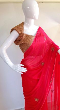 Soft reddish pink jute net saree with all over gold hand embroidered feathers paired with an embroidered red pink sequin blouse. Saree fabric is light soft jute net in a flattering soft beige gold shade and is light and easy to drape. The blouse has red sequins and gold thread work embroidered all over . Be a glowing beauty in this classy piece. Shipping: Ships in 1-2 days of payment via registered post with tracking number. Delivery takes about 4-5 days all around the word. Extra services: We c Pink Party Wear Saree For Festive Season, Pink Party Wear Saree For Festive Occasions, Festive Pink Party Wear Saree, Party Wear Saree With Zari Work, Traditional Sequined Saree, Party Wear Saree For Navratri Festive, Red Sequined Traditional Wear For Festive Occasions, Party Pre-draped Saree With Gota Work, Pink Party Wear Pre-draped Saree For Festivals