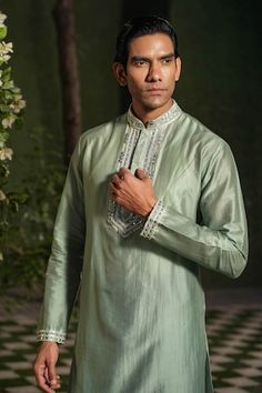 Turquoise full sleeve kurta with thread, sequin embroidered placket. Paired with churidar. - Aza Fashions Traditional Fit Long Sleeve Kurta For Festive Occasions, Festive Long Sleeve Traditional Fit Kurta, Traditional Fit Long Sleeve Kurta With Dabka, Traditional Fit Long Sleeve Bandhgala For Diwali, Festive Long Sleeve Traditional Kurta, Traditional Long Sleeve Sherwani With Cutdana, Green Long Sleeve Bandhgala With Naqshi, Festive Traditional Fit Bandhgala With Long Sleeves, Festive Bandhgala With Long Sleeves