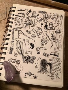 a notebook with some drawings on it