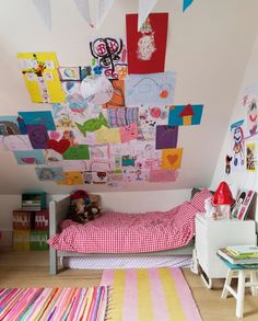 a child's bedroom decorated in bright colors