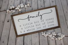 a sign that says, family a little bit of crazy is a little bit of loud and a whole lot of love