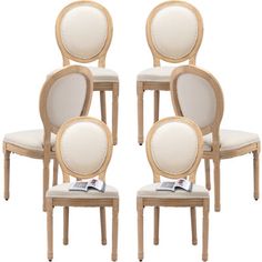 six chairs with white upholstered back cushions