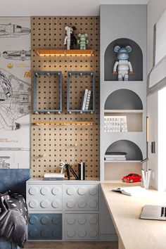 a room with a bed, desk and shelves on the wall that have legos on them