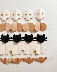 several pieces of paper cut out to look like bats