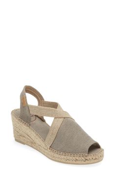 A jute-wrapped wedge and platform further the breezy warm-weather style of a casual-chic sandal. 2 1/4" heel; 1" platform (size 8-8.5US / 39EU) 3" strap height Slip-on style Textile upper and lining/synthetic sole Made in Spain Women's Shoes Beige Espadrille Wedge Sandals With Wrapped Heel, Beige Open Toe Canvas Sandals, Closed Toe Canvas Sandals For Beach, Canvas Open Toe Wedge Sandals For Spring, Spring Canvas Open Toe Wedge Sandals, Casual Beige Canvas Sandals, Comfortable Natural Color Wedge Heel Sandals, Casual Closed Toe Canvas Wedge Sandals, Casual Canvas Wedge Sandals For Vacation