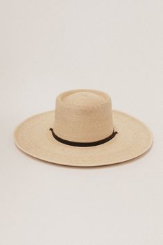 DESCRIPTION The Pecos is made of fine, handwoven Mexican tripilla palm. Its heavy, well-made construction will hold up for years to come. Fine details like a dark leather chinstrap and wooden bead help make the hat stand out amongst its peers, and we think it will help you do the same. It features a moisture-wicking, padded sweatband for comfort. HAT SIZE CHART 55 57 59 61 63 Size S M L XL 2XL Inches 21 1/2" 22 1/4" 23 23 7/8" 24 5/8" Fitted Size 6 7/8 7 1/4 7 1/2 7 5/8 7 7/8 Natural High Crown Toquilla Straw Hat, Adjustable High Crown Toquilla Straw Panama Hat, High Crown Natural Panama Hat For Beach, High Crown Natural Color Panama Hat For Beach, Natural Toquilla Straw Hat With High Crown, Natural High Crown Panama Hat For Beach, Classic High Crown Hat Bands For Beach, Classic Natural Woven Hat, Natural High Crown Straw Hat For Vacation