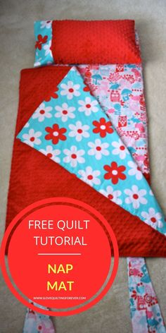 a red and blue quilt with the text free quilt pattern nap mat