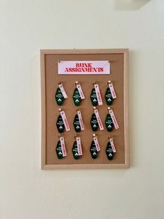 a bulletin board with pins and magnets on it