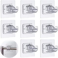 eight pieces of clear glass with metal latches on each side and one piece in the middle