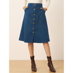 Indulge in a perfect blend of comfort and style with this ribbed corduroy A-line skirt. The high-fitted waist and slightly flared hem add a touch of elegance to the skirt, while the matching waist tie accentuates your curves, creating a flattering silhouette. The elastic waist and belted detail make it comfortable to wear all day long. This versatile skirt is suitable for any occasion, be it a party, a day out shopping, or a day at the office. The midi length adds a touch of sophistication to th Winter Corduroy Skirt With Button Closure, Blue Skirt With Button Closure For Fall, Corduroy Skirt With Buttons, Midi Jeans Skirt, Corduroy Midi Skirt, Midi Jeans, Midi Length Skirts, Women Midi, Fall Skirts