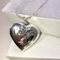 “Hearts Entertwined!" . 925 Stamped Sterling Silver Double Heart Locket Pendant (Can Hold A Picture Inside!) On A .925 Stamped Sterling Silver 20 Inch Long Necklace. It Is Super Pretty! Makes The Perfect Present! Brand New In A Gift Box! Price Is $30 Check Out My Other Listings For More Great Items Thank You! Silver Locket Necklace Vintage, Elegant Silver Locket Necklace For Mother's Day, Silver Heart Necklace For Mother's Day, Silver Elegant Locket Necklace For Valentine's Day, Silver Locket Necklace For Mother's Day Anniversary, Silver Double Heart Locket Necklace For Keepsake, Sterling Silver Double Heart Locket For Mother's Day, Silver Locket Necklace For Mother's Day, Silver Double Heart Necklace With Hallmark