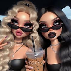 two dolls are dressed in black and one is holding a drink with her mouth open