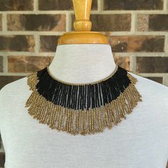 Black And Gold Tassel Necklace. Necklace Is 18 Inches Long With A 2 Inch Extension Chain. Elegant Black Tassel Necklace, Elegant Hand-strung Black Beaded Necklace, Hand-strung Black Beaded Necklace, Cheap Hand-strung Black Beaded Necklaces, Mrs Necklace, Layered Coin Necklace, Black Bohemian Hand-strung Necklaces, Juicy Couture Necklace, Gold Tassel Necklace