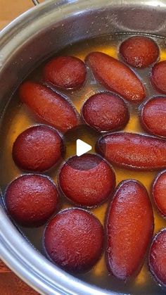 the food is being cooked in the pot on the stove